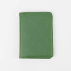 Sage green leatherette passport wallet, closed front view