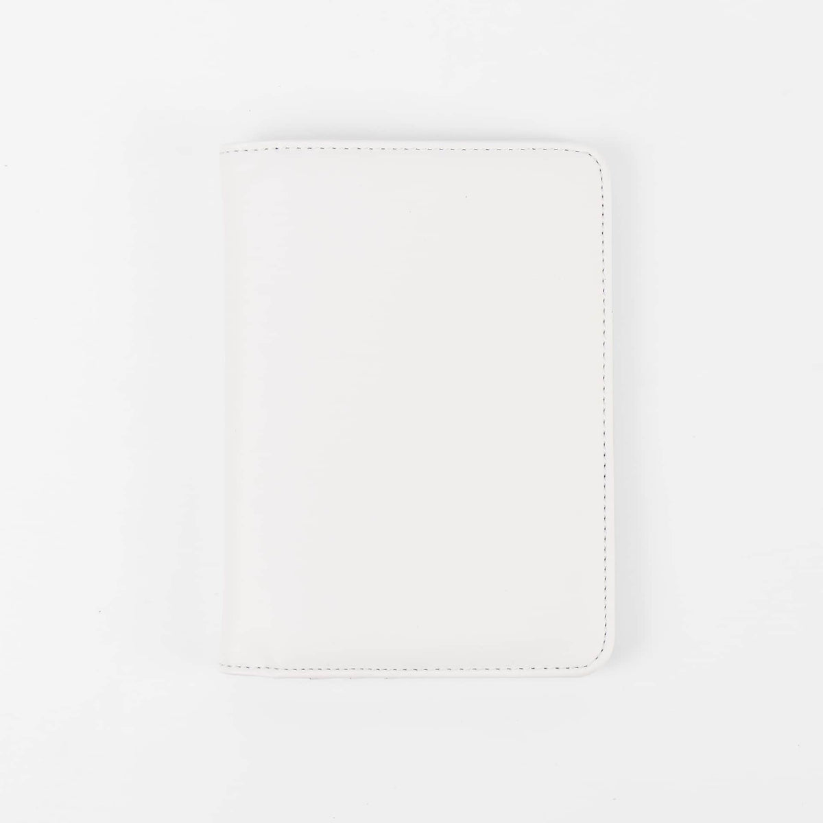White leatherette passport wallet, closed front view