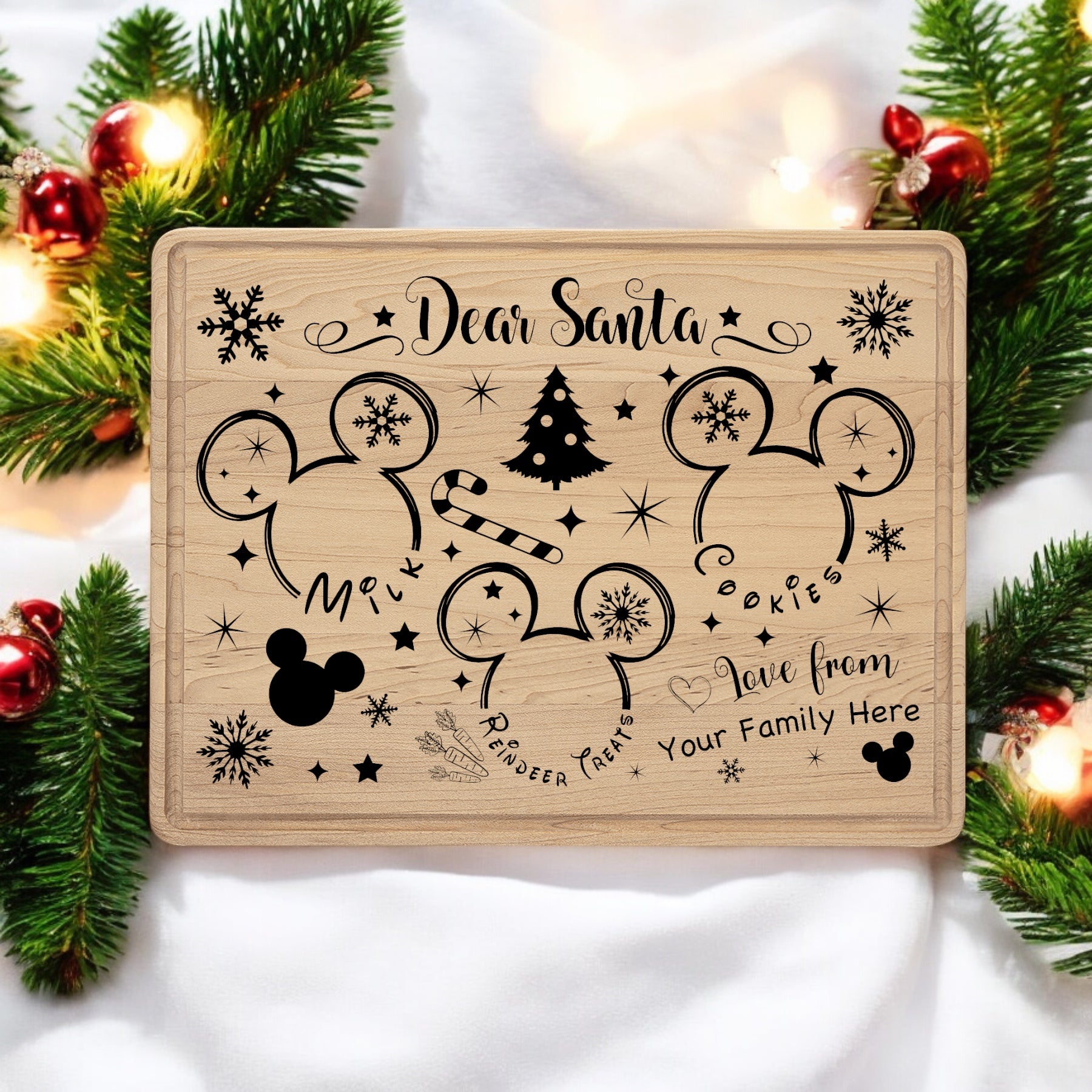 Maple 12 by 9 inch Santa treat tray engraved with a Dear Santa message, mouse-ear silhouettes and a Christmas tree, staged with garland and ornaments