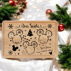Maple 9 by 6 inch Santa treat tray engraved with a Dear Santa message, mouse-ear silhouettes and a Christmas tree, staged with garland and ornaments
