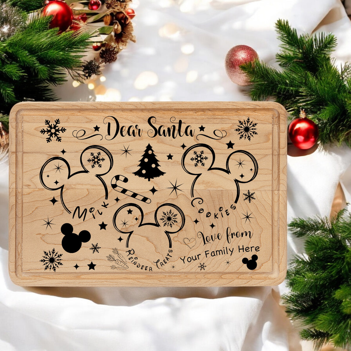 Maple 9 by 6 inch Santa treat tray engraved with a Dear Santa message, mouse-ear silhouettes and a Christmas tree, staged with garland and ornaments