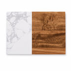 Flat overhead view of the valet tray surface, half white marble veining and half warm acacia wood grain