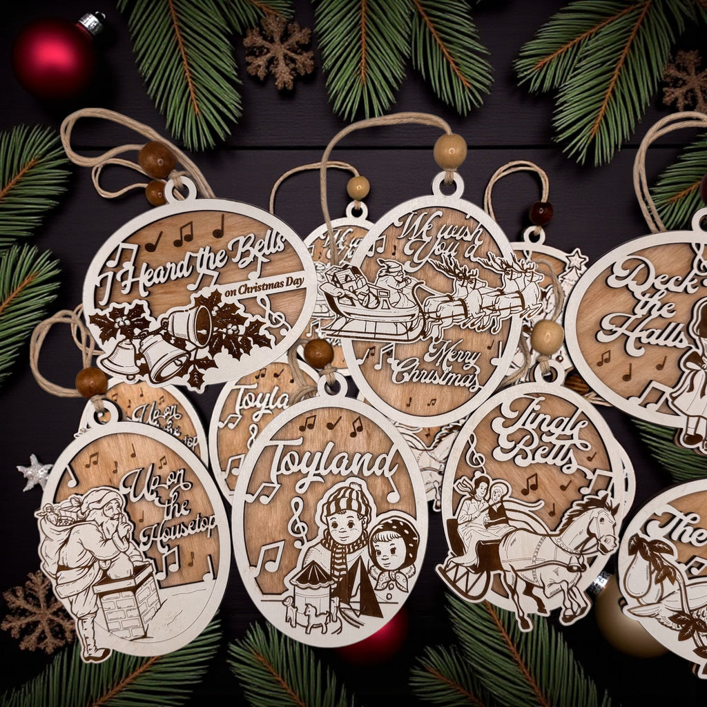 All six engraved wooden carol ornaments laid out together, each strung on a hanging cord