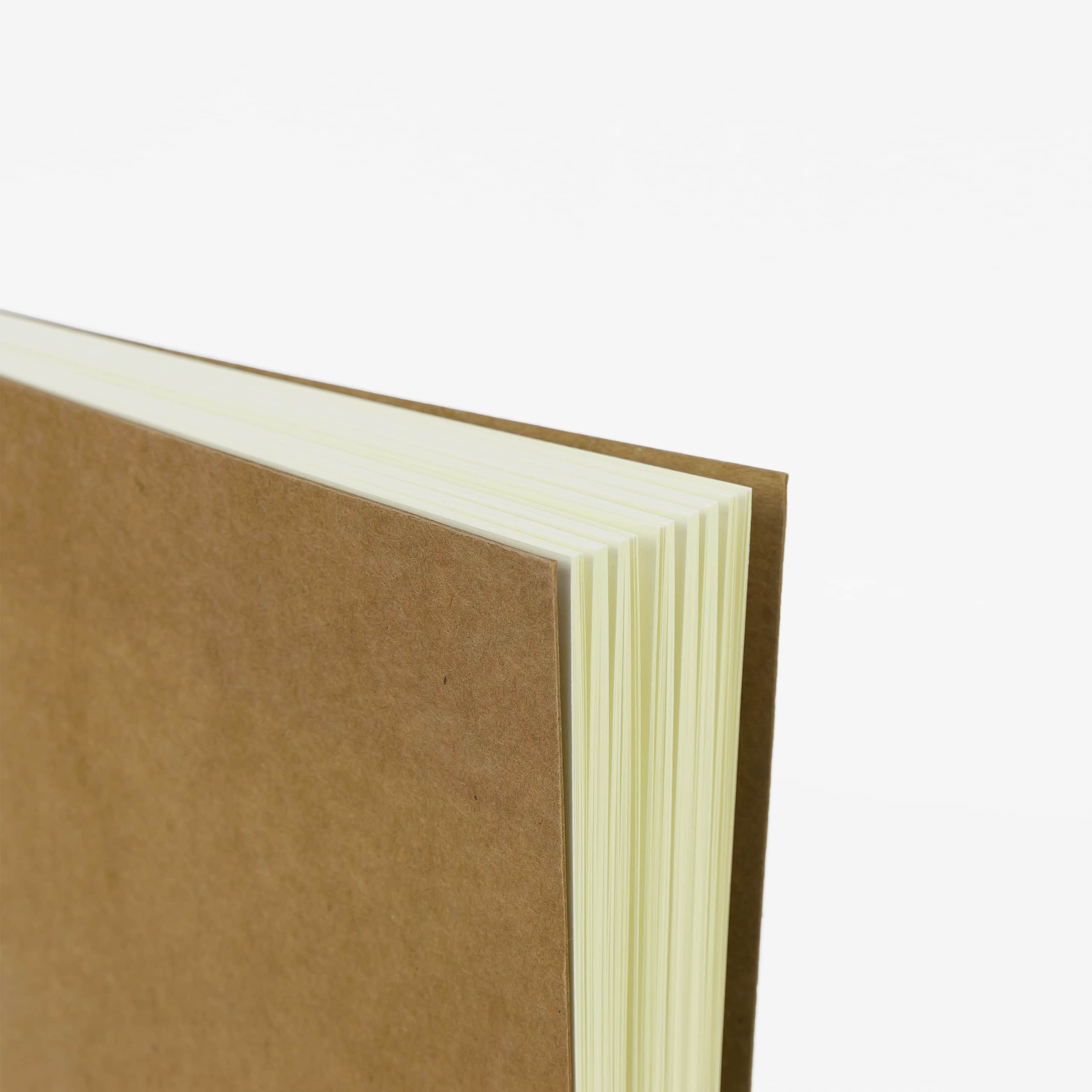 Corner detail of a refill notebook showing the thickness of the 120-page block