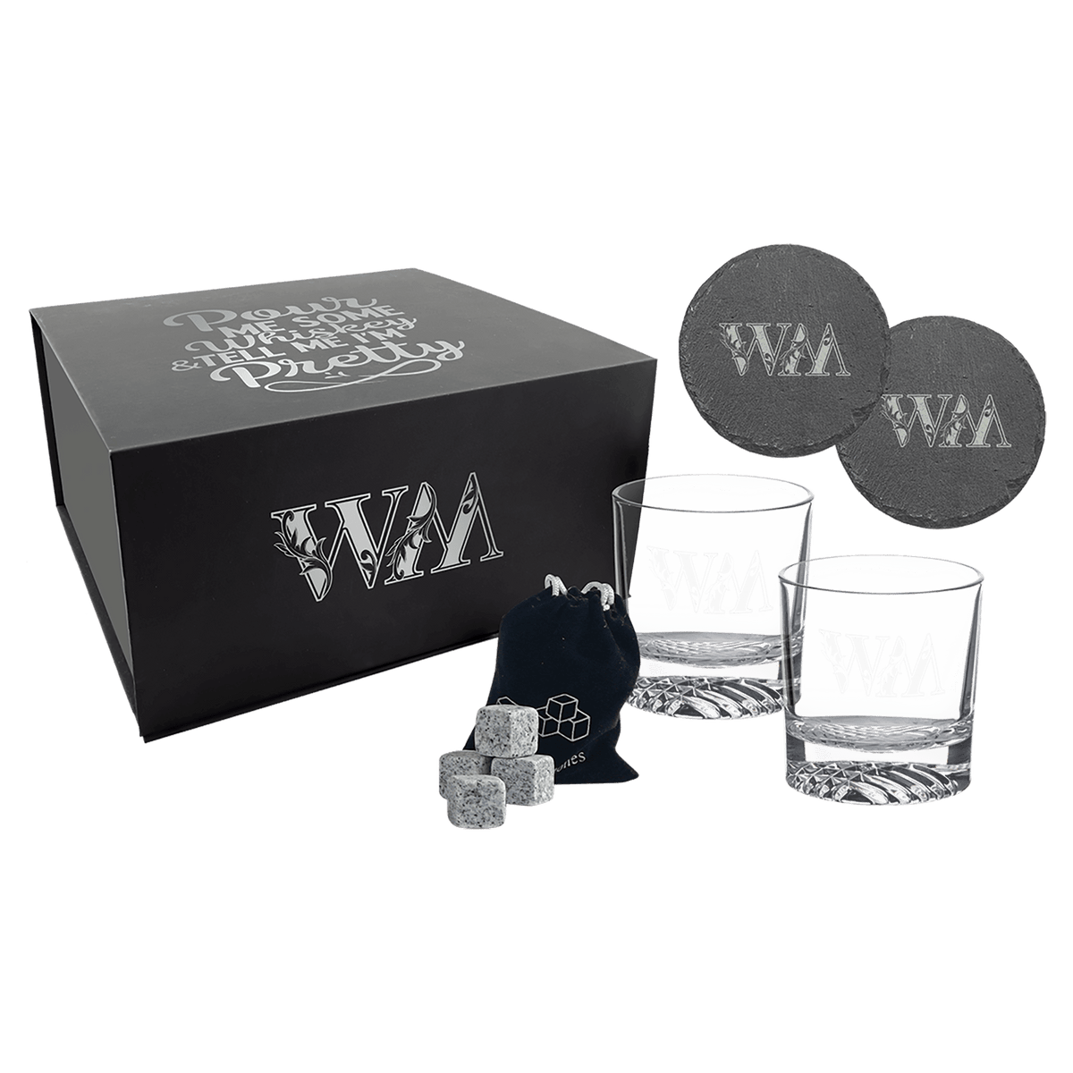 Whiskey gift set engraved with a monogram and a script phrase on the box lid, with engraved glasses, slate coasters and whiskey stones