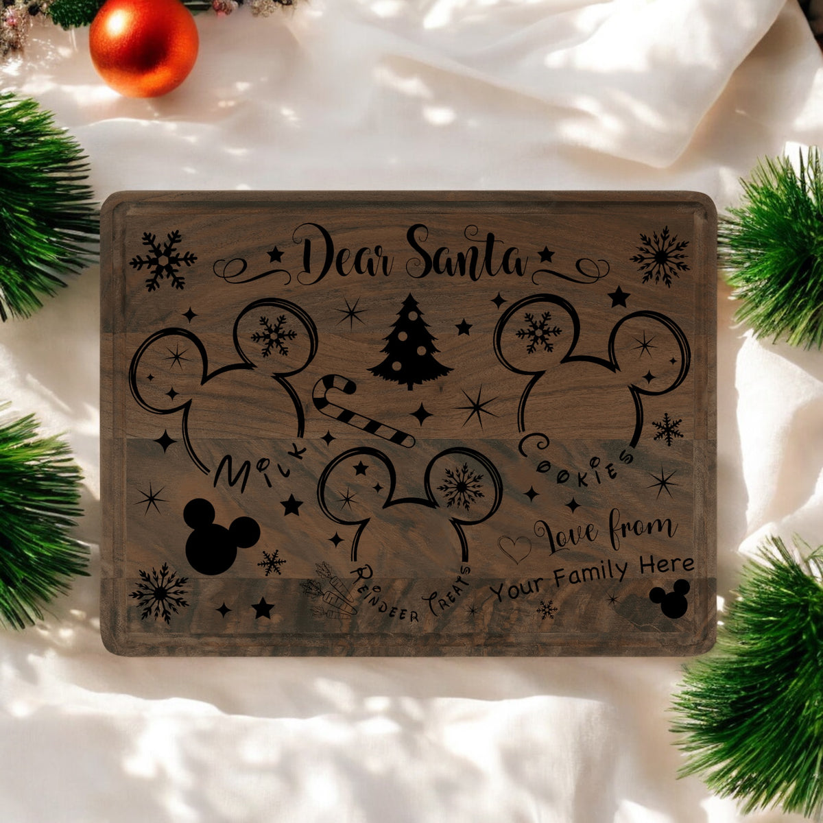 Walnut 12 by 9 inch Santa treat tray engraved with a Dear Santa message, mouse-ear silhouettes and a Christmas tree, staged with garland and ornaments