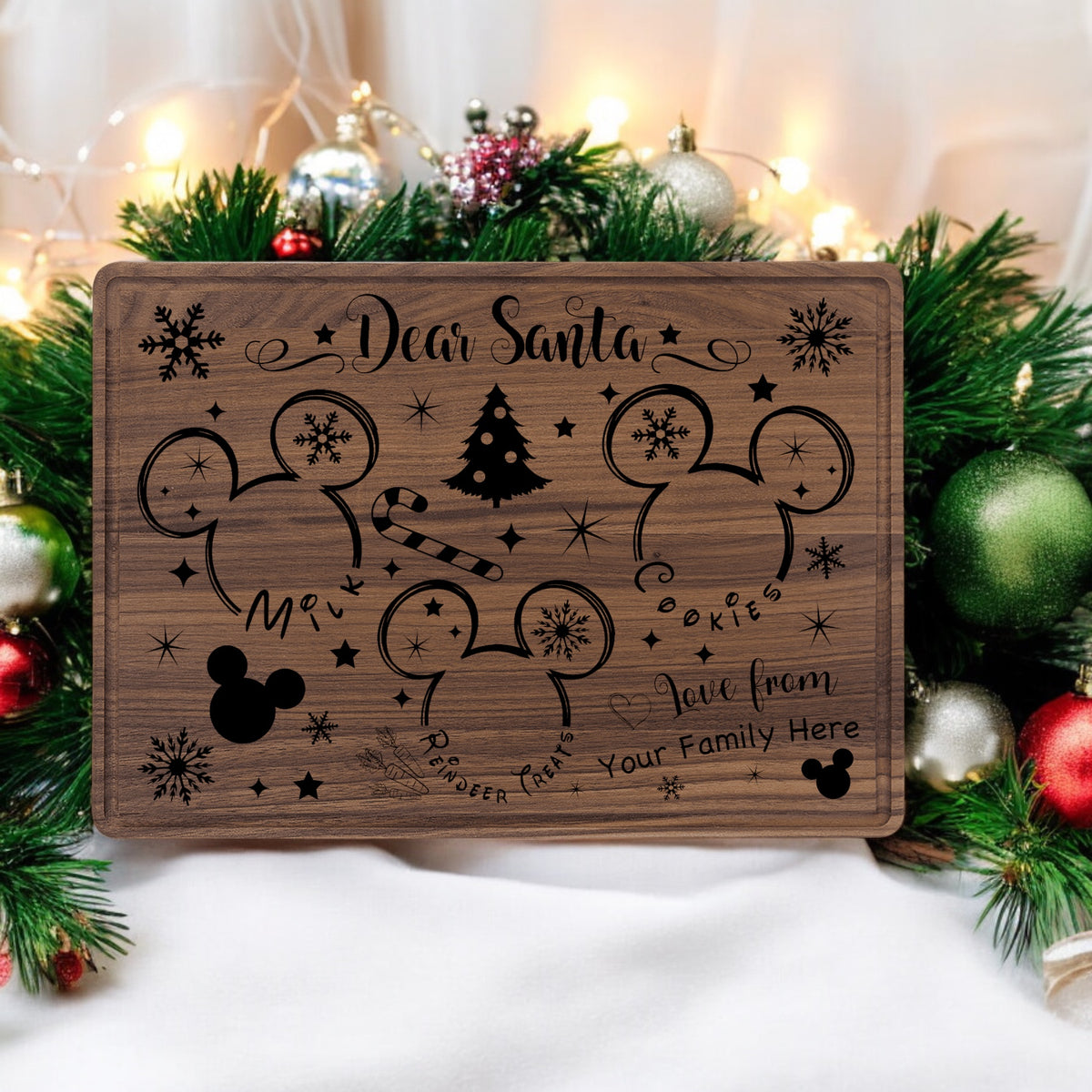 Walnut 14 by 10 inch Santa treat tray engraved with a Dear Santa message, mouse-ear silhouettes and a Christmas tree, staged with garland and ornaments
