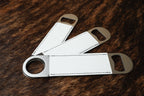 Three stainless steel bar bottle openers wrapped in Bright White Premium Leatherette, fanned out to show the wrap and the opener end.