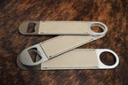 Three stainless steel bar bottle openers wrapped in Sand beige Premium Leatherette, fanned out to show the wrap and the opener end.