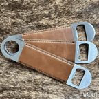 Three stainless steel bar bottle openers wrapped in Walnut brown Premium Leatherette, fanned out to show the wrap and the opener end.