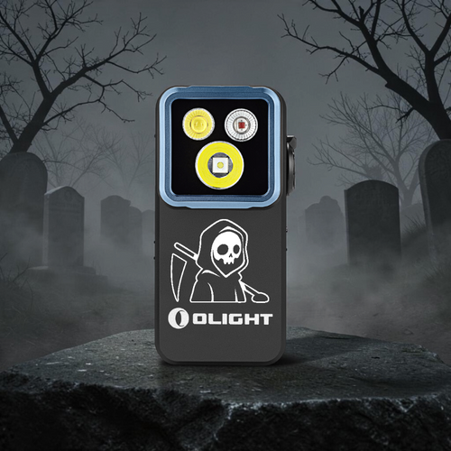 Olight Oclip 2 Pro Skull Hood with a carved hooded reaper, resting on a stone slab in a foggy graveyard