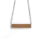 Horizontal bar pendant in natural wood on a stainless steel chain