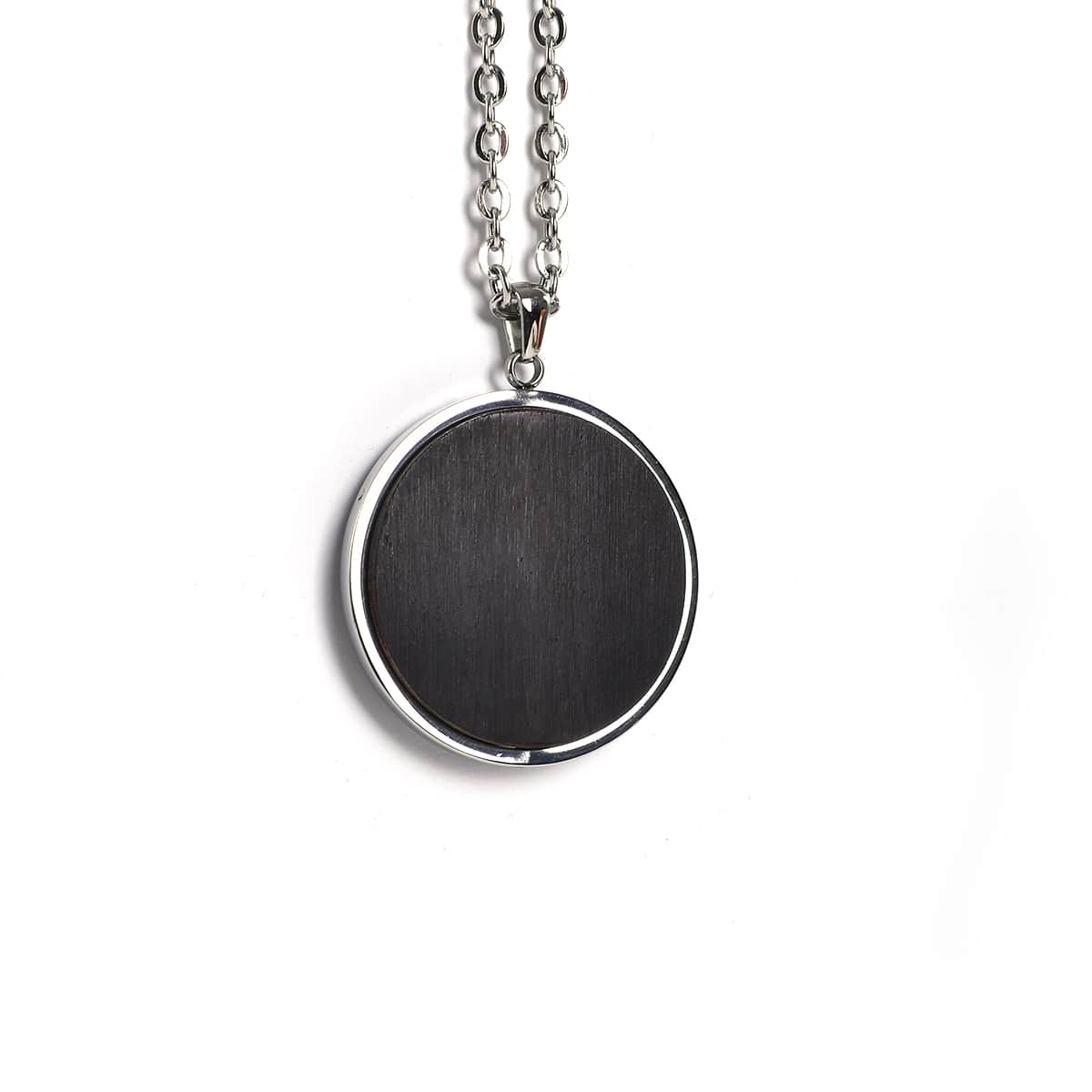 Round pendant in black African blackwood on a stainless steel chain