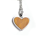 Heart pendant in natural wood on a stainless steel chain