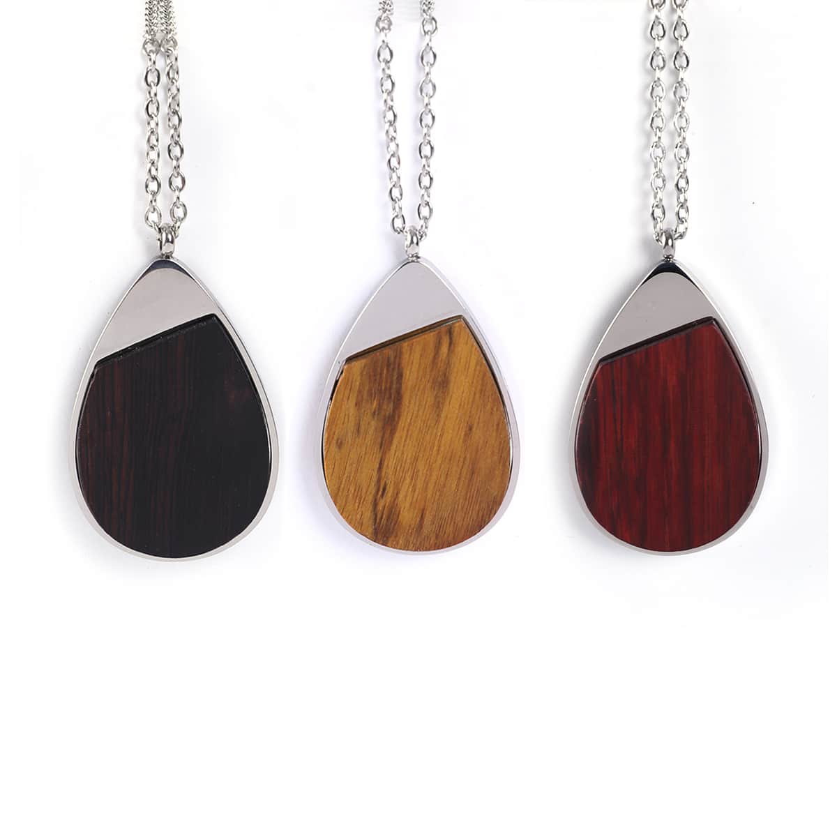 Teardrop wood pendant necklaces in natural, black and rosewood inlay set in stainless steel — custom engraved wood pendant necklace by Solano Laser Craft