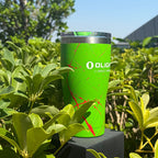 Zombie Green tumbler outdoors among green leaves