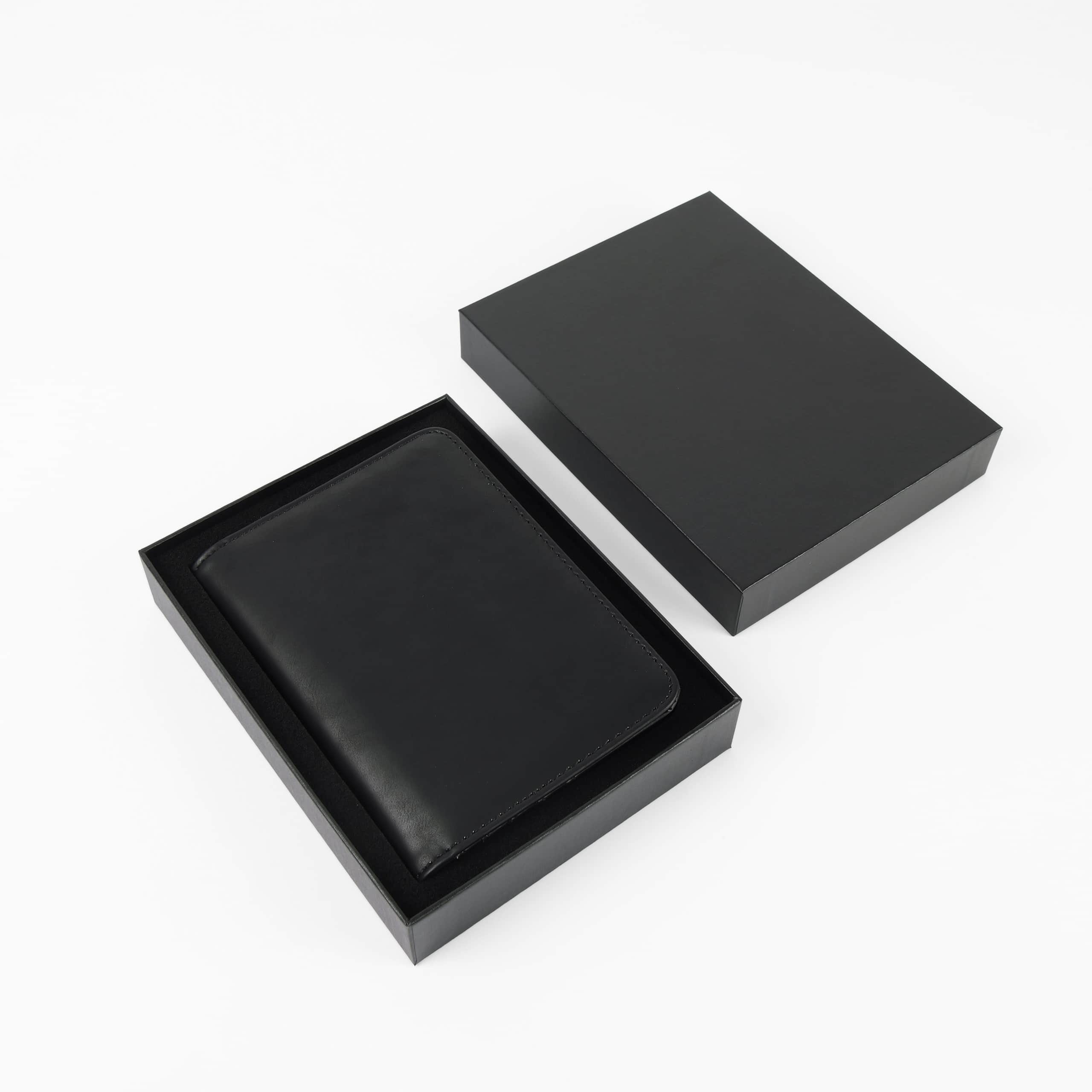 Leatherette passport wallet in its gift box — custom engraved passport cover by Solano Laser Craft