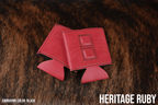 Ruby red Premium Leatherette magnetic can coozie, standard 12 oz. size, shown folded to reveal the built-in magnets