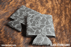 Black Storm grey camouflage Premium Leatherette magnetic can coozie, standard 12 oz. size, shown folded to reveal the built-in magnets