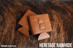 Rawhide tan Premium Leatherette magnetic can coozie, standard 12 oz. size, shown folded to reveal the built-in magnets