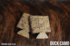 Duck Camo Premium Leatherette magnetic can coozie, standard 12 oz. size, shown folded to reveal the built-in magnets