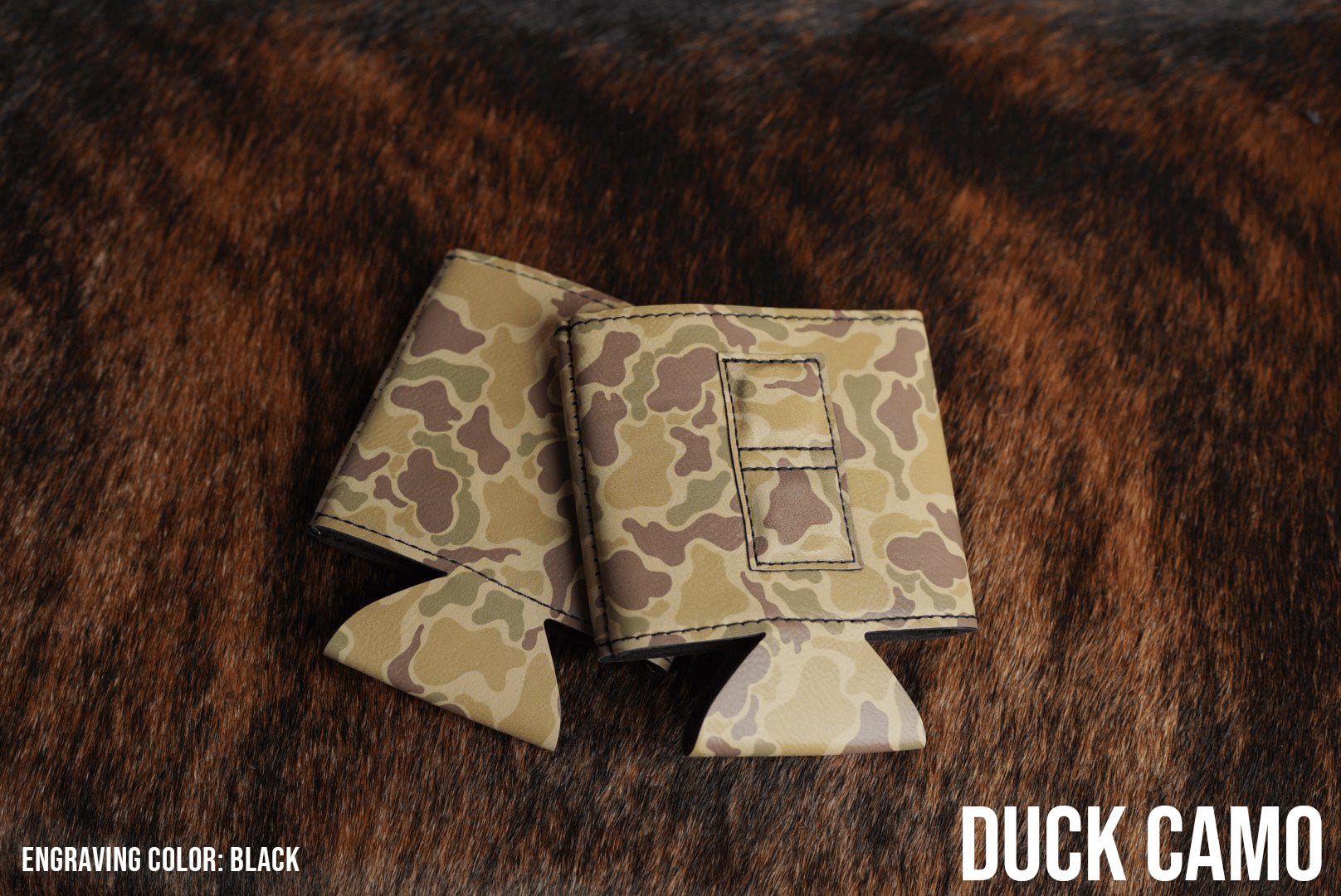 Duck Camo Premium Leatherette magnetic can coozie, standard 12 oz. size, shown folded to reveal the built-in magnets