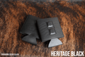 Black Premium Leatherette magnetic can coozie, standard 12 oz. size, shown folded to reveal the built-in magnets