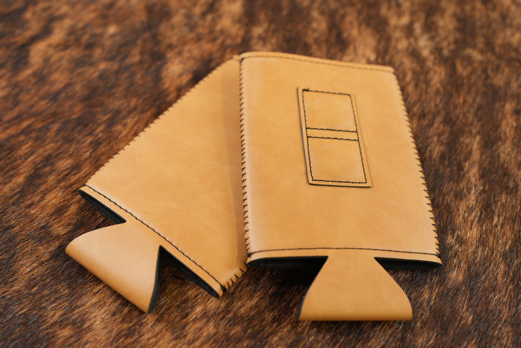 Saddle Tan Premium Leatherette magnetic can coozie, slim can size, shown folded to reveal the built-in magnets