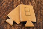 Saddle Tan Premium Leatherette magnetic can coozie, slim can size, shown folded to reveal the built-in magnets