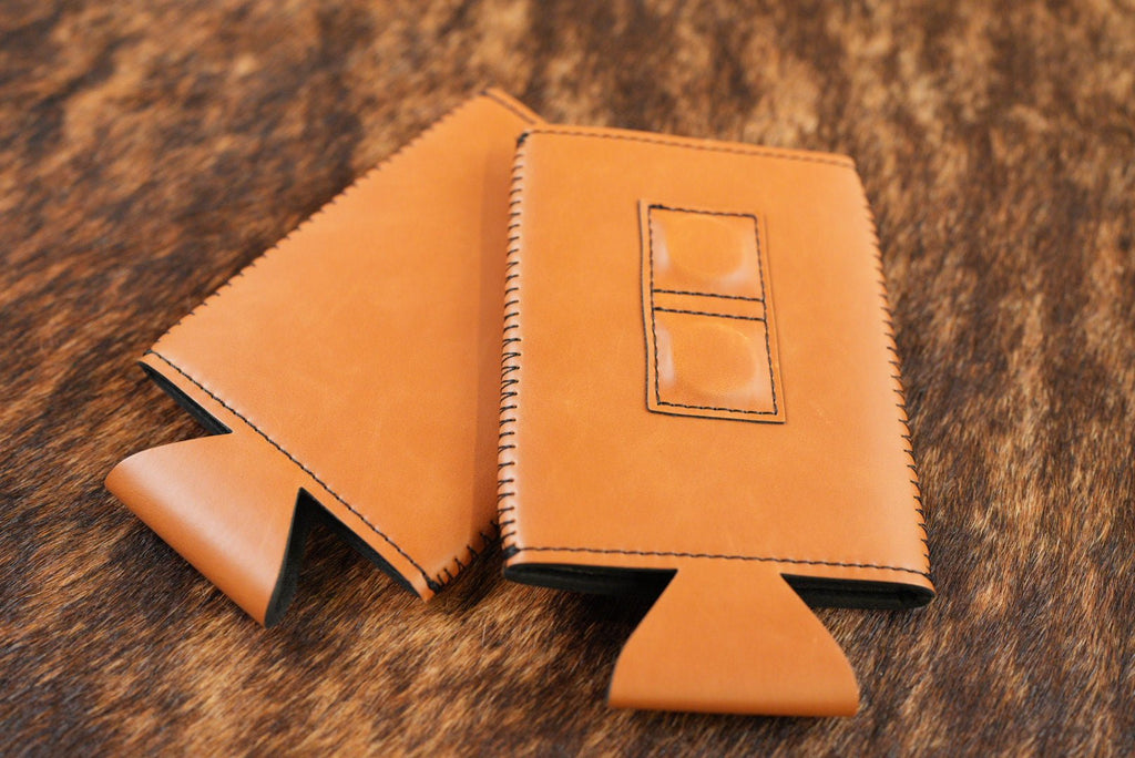 Buckskin tan Premium Leatherette magnetic can coozie, slim can size, shown folded to reveal the built-in magnets