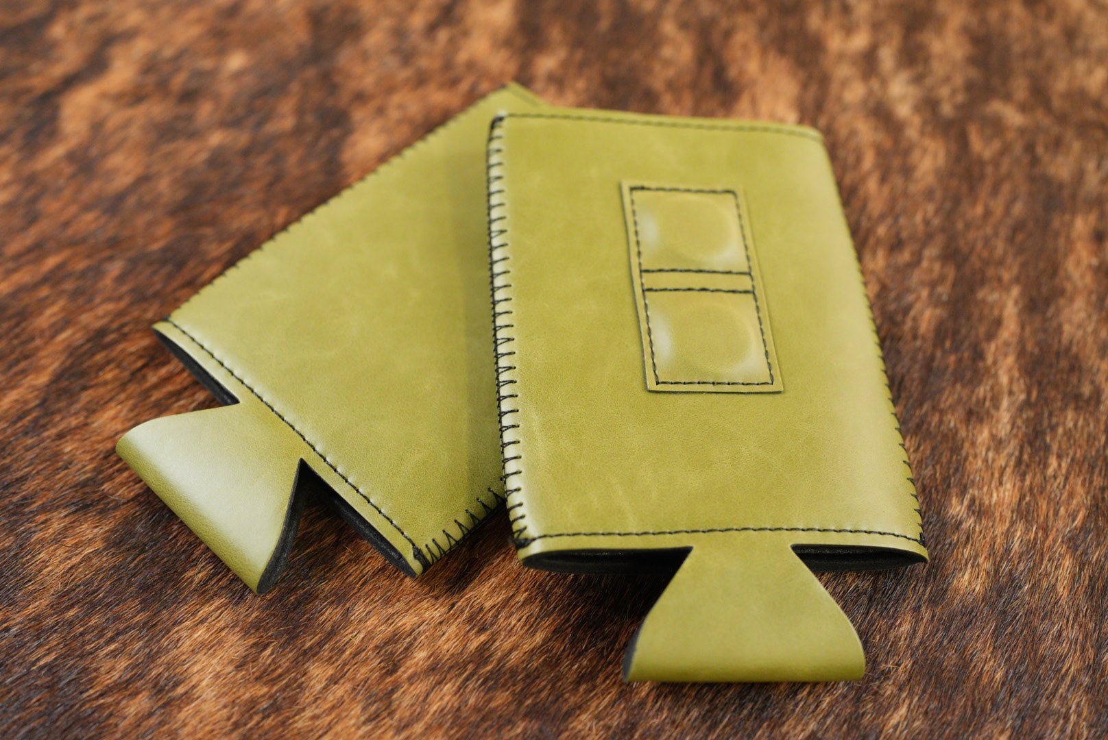 Olive green Premium Leatherette magnetic can coozie, slim can size, shown folded to reveal the built-in magnets