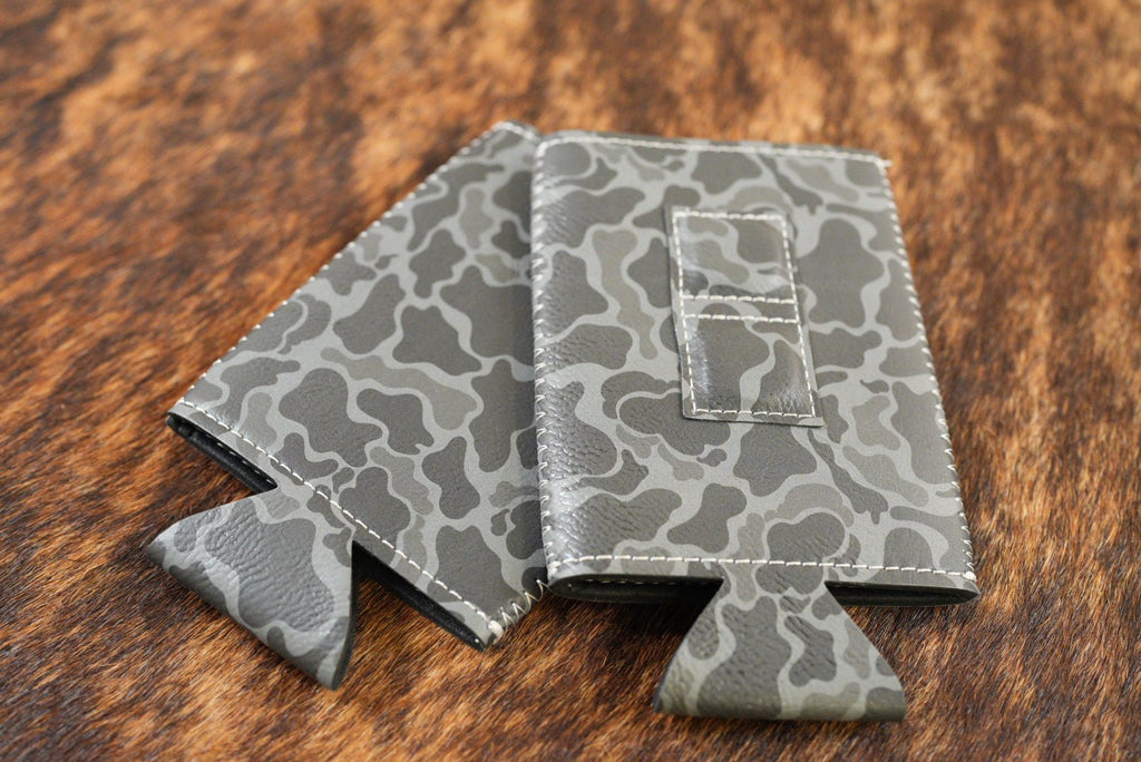 Black Storm grey camouflage Premium Leatherette magnetic can coozie, slim can size, shown folded to reveal the built-in magnets