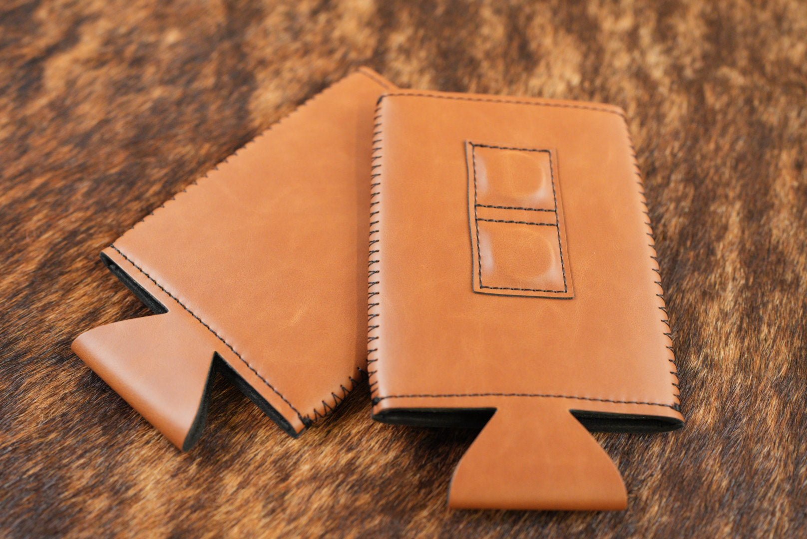 Rawhide tan Premium Leatherette magnetic can coozie, slim can size, shown folded to reveal the built-in magnets