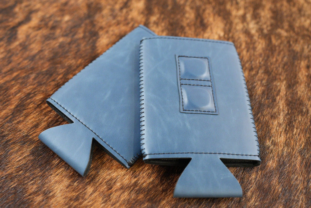 Indigo blue Premium Leatherette magnetic can coozie, slim can size, shown folded to reveal the built-in magnets