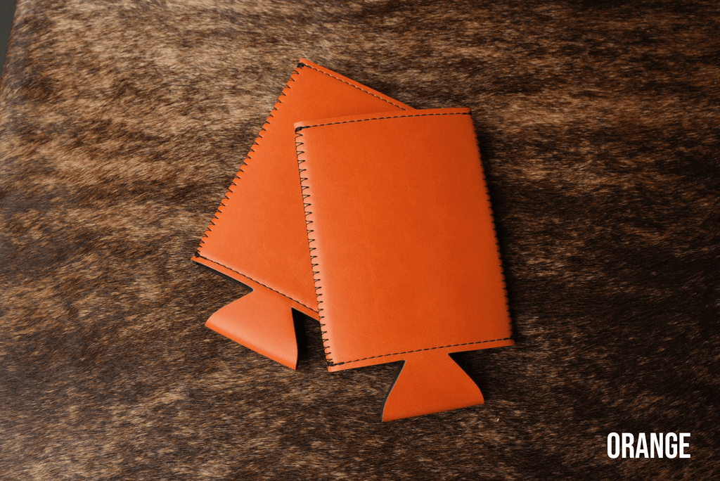 Burnt orange Premium Leatherette slim can coolers, sized for slim cans, laid flat and collapsed.