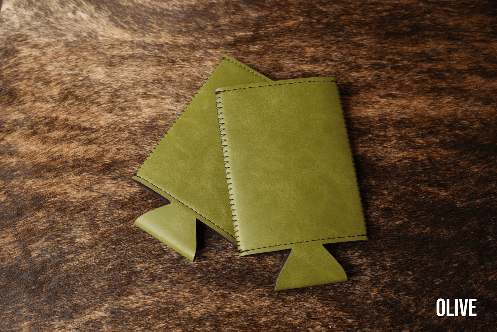 Olive green Premium Leatherette slim can coolers, sized for slim cans, laid flat and collapsed.