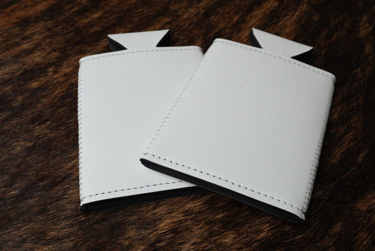 Slim can coozie in Bright White leatherette, shown blank