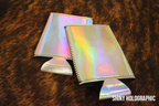 Slim can coozie in Shiny Holographic leatherette with a rainbow mirror finish, shown blank