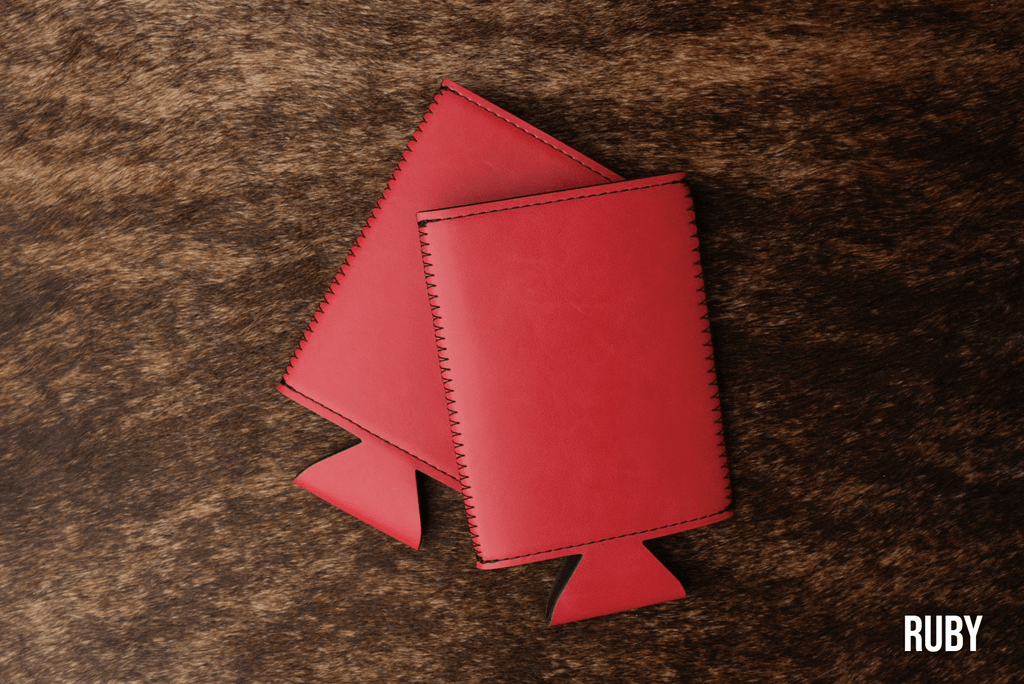 Ruby red Premium Leatherette slim can coolers, sized for slim cans, laid flat and collapsed.