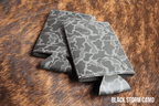 Slim can coozie in Black Storm grey camouflage leatherette, shown blank