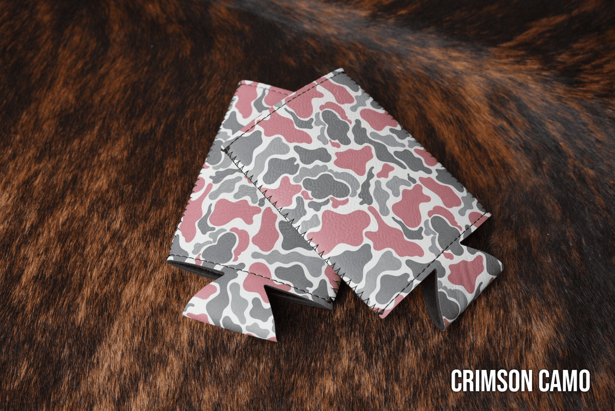 Crimson Camo Premium Leatherette slim can coolers in a red camouflage pattern, sized for slim cans.