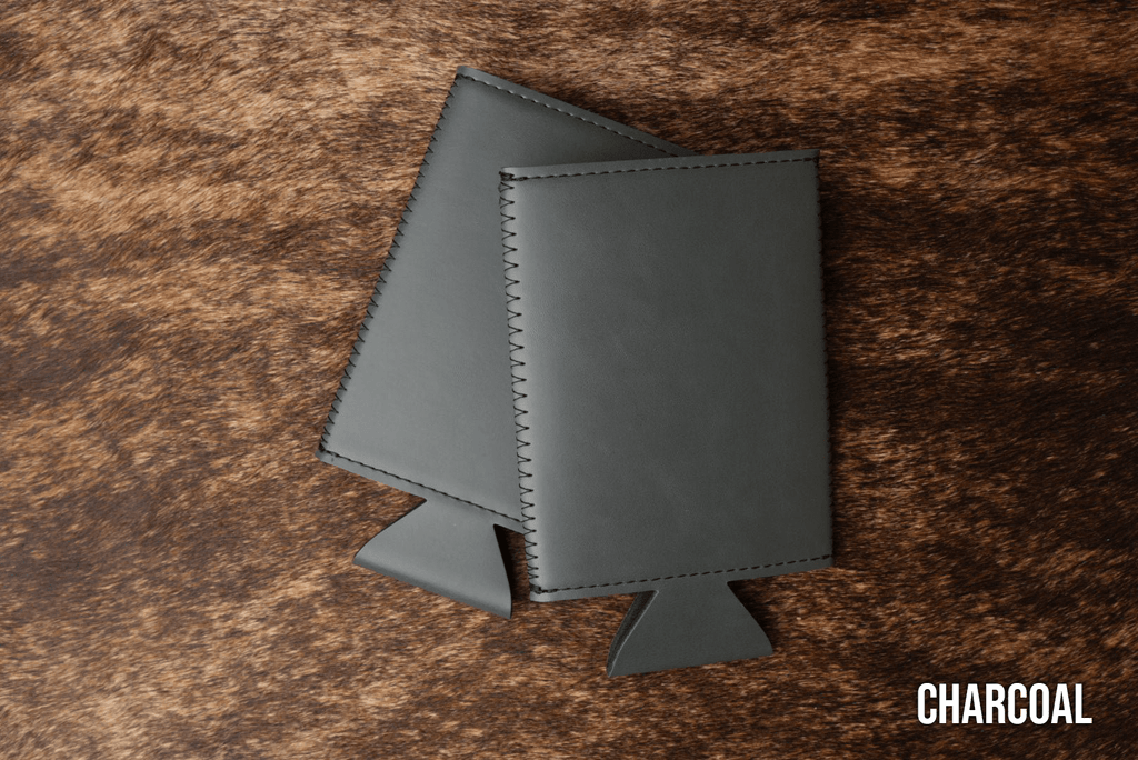 Charcoal grey Premium Leatherette slim can coolers, sized for slim cans, laid flat and collapsed.