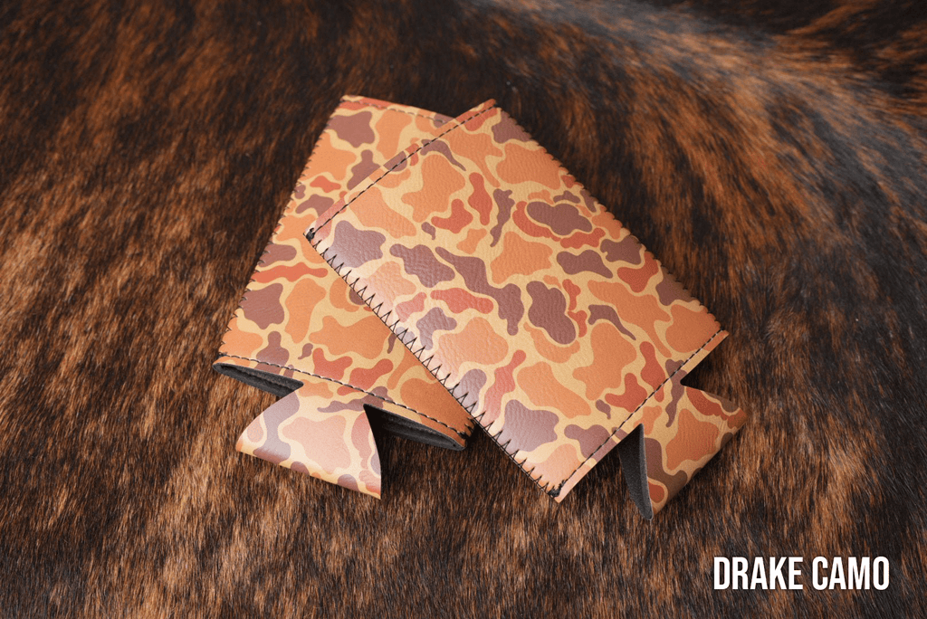Drake Camo Premium Leatherette slim can coolers in a duck camouflage pattern, sized for slim cans.
