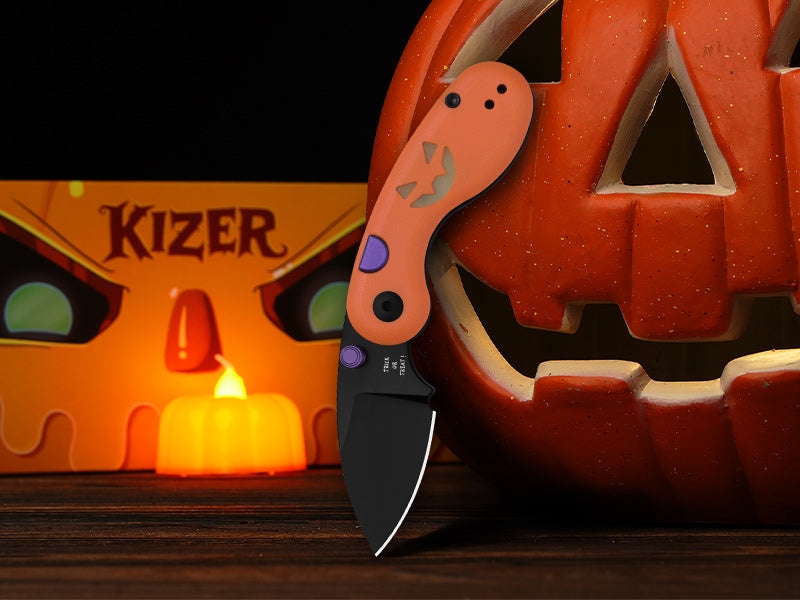 Kizer Microbe Halloween Edition beside a glowing carved pumpkin