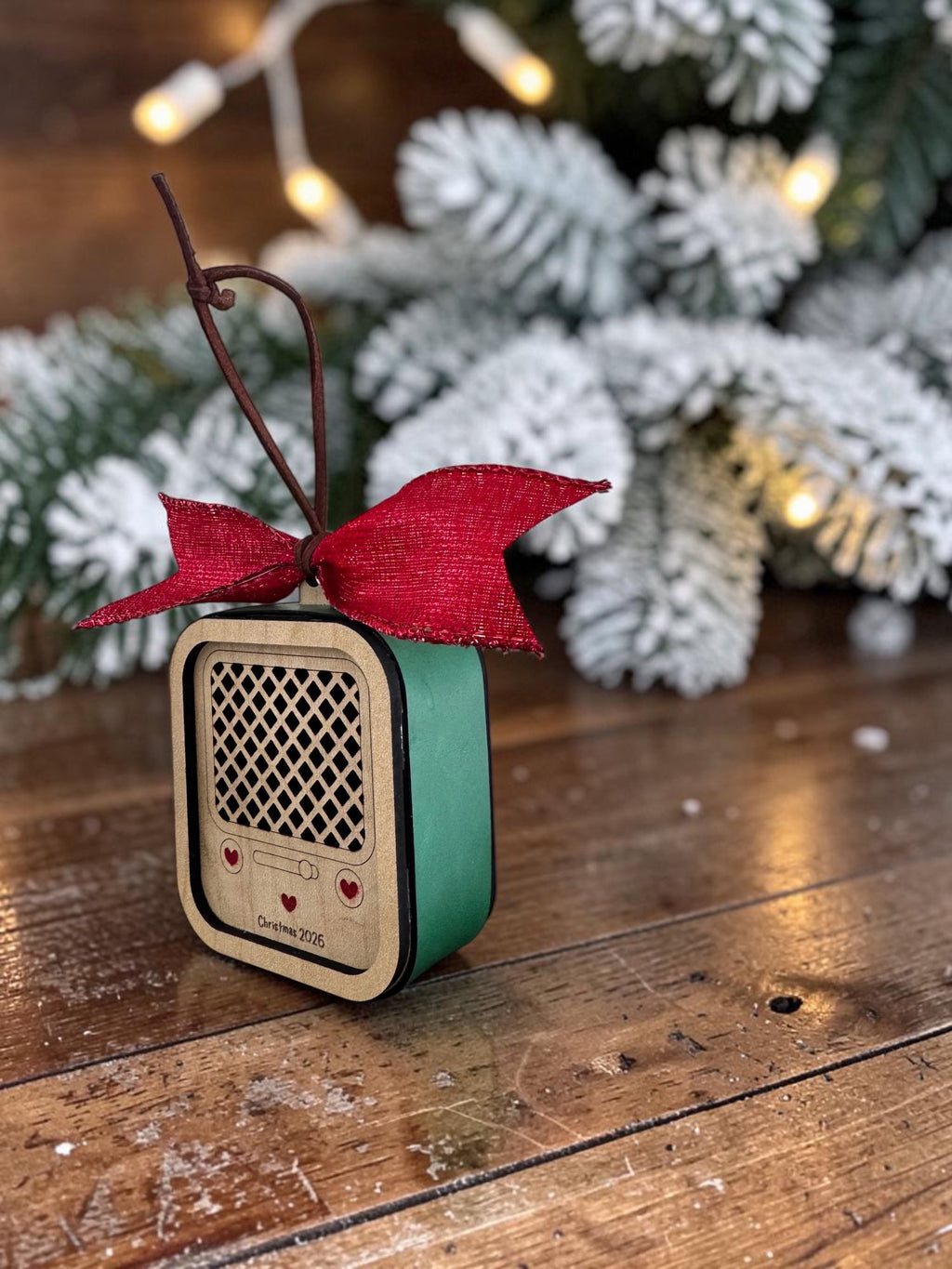 Side view of the Vintage Radio ornament showing its Kelly Green leatherette wrap